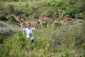 Giraffes and Lilian at Arusha Park